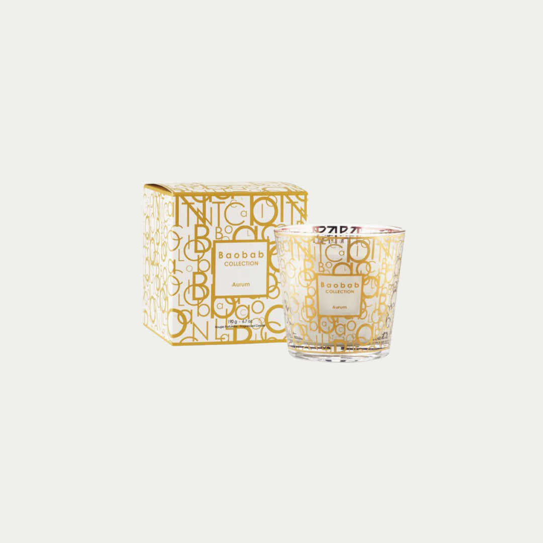 Vela perfumada MY FIRST BAOBAB AURUM em recipiente dourado